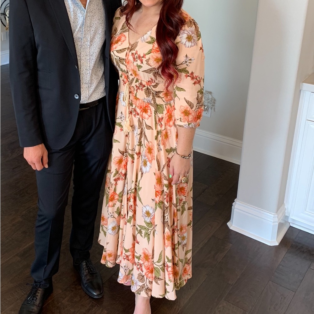 3/4 sleeve floral dress with button front & flowy bottom